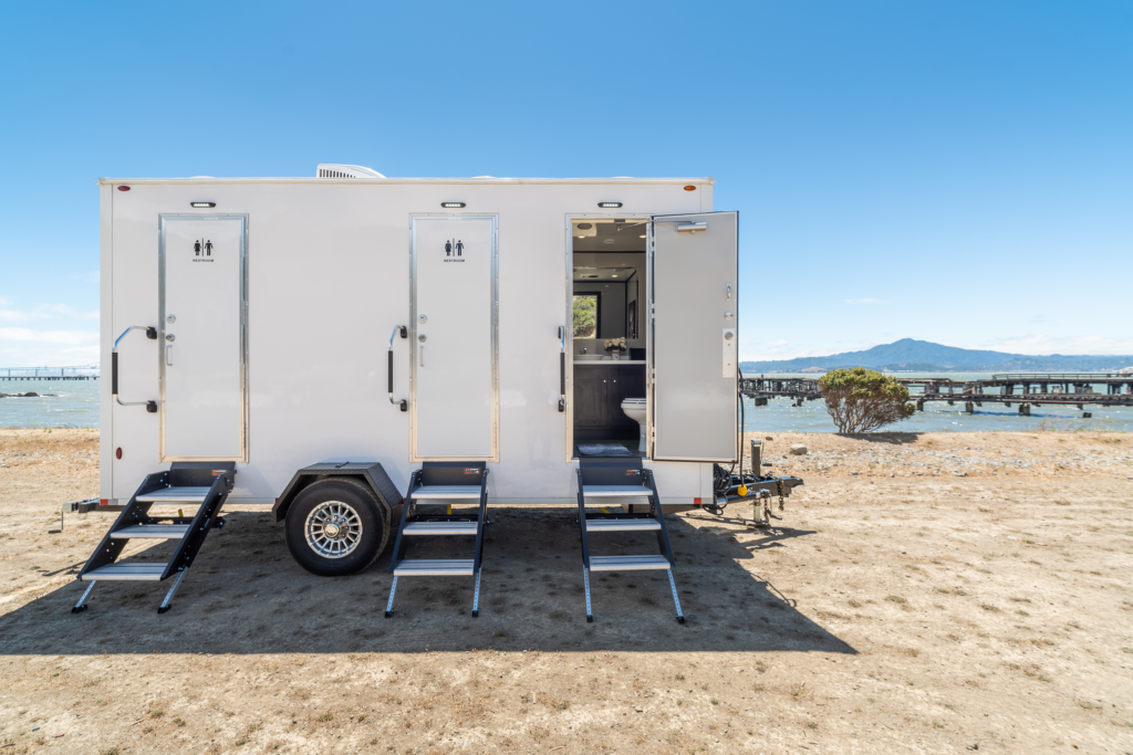 Coastal Throne Co. Pemaquid luxury restroom trailer interior at coastal Maine wedding venue